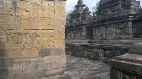 Bas-relief and carved pattern at the Buddhist Borobudur temple, in Indonesia Stock Footage 222953424