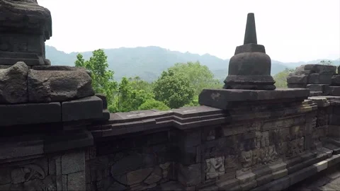 Bas Relief and Stupa on the wall, Borobudur Temple Terrace, Java, Indonesia Stock Footage 308110637