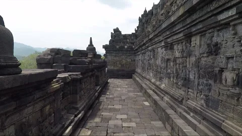 Bas Relief and Stupa on the wall, Borobudur Temple Terrace, Java, Indonesia Stock Footage 308191644