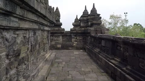 Bas Relief and Stupas on the wall, Borobudur Temple Terrace, Java, Indonesia Vídeos de archivo 306615142