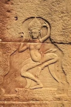A bas relief, bas-relief, stone carving on a wall of the Banteay Kdei Temple, Stock Photos