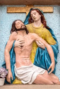 Bas-relief to colors representing The Pity of Michelangelo Stock Photos