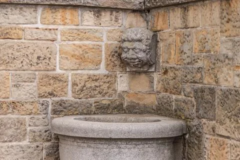 Bas-relief on the corner of the house Stock Photos