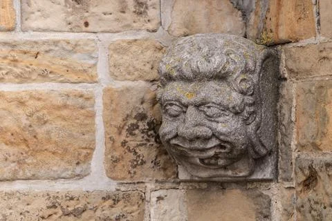 Bas-relief on the corner of the house Stock Photos