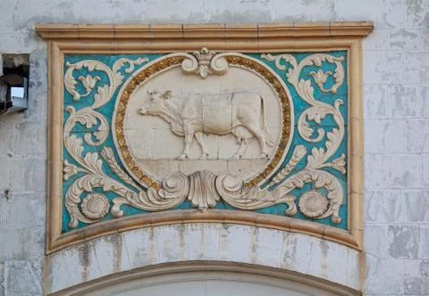 Bas-relief of the Soviet era in the building of the livestock pavilion. Kiev. Stock Photos
