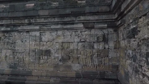 Bas Relief on the wall of the Borobudur Temple, Java, Indonesia Stock Footage 241878322