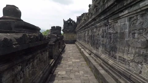 Bas Relief on the wall, Buddha Statue, Borobudur Temple Terrace, Java, Indonesia 스톡 동영상 308251039