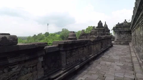 Bas Relief on the wall, Buddha Statue, Borobudur Temple Terrace, Indonesia 스톡 동영상 309291296
