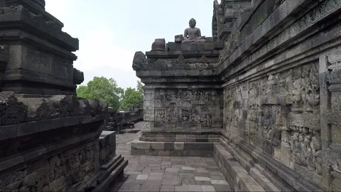 Bas Relief on the wall, Buddha Statue, Borobudur Temple Terrace, Indonesia Stock Footage 309305496