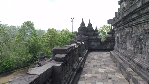 Bas Relief on the wall, Headless Buddha Statue, Borobudur Temple, Indonesia Video stock 308866667