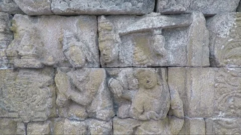 Bas Relief, Wall of Temple Terrace, Borobudur, Java, Indonesia Stock Footage 243970299