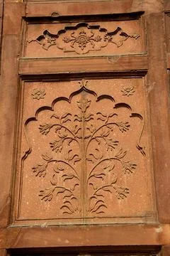 Bas Relief Work at Red Fort Close up of bas relief etching on wall at Red ... Stock Photos