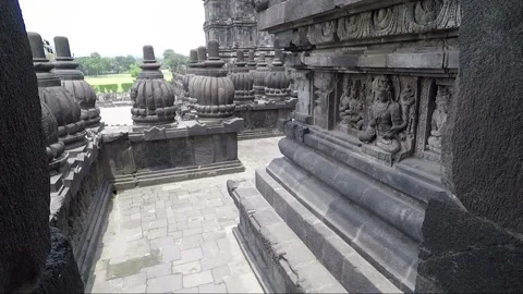 Bas Reliefs and Pinnacles on Terrace, Shiva Temple, Prambanan, Java, Indonesia Stock Footage 247011043
