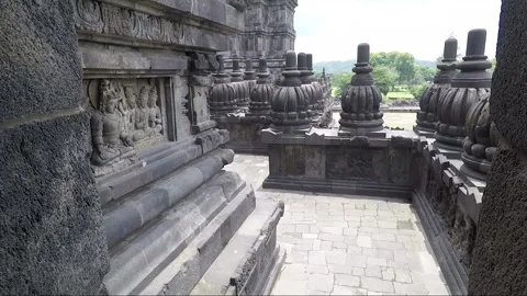 Bas Reliefs and Pinnacles on Terrace, Shiva Temple, Prambanan, Java, Indonesia Stock Footage 247012632