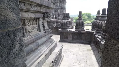 Bas Reliefs and Pinnacles on Terrace, Shiva Temple, Prambanan, Java, Indonesia Stock Footage 247012647
