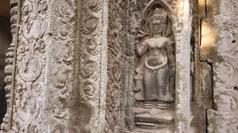 Bas-reliefs depicting the divine dancer Apsara, the temple of TA Prom Stock Footage 106051064