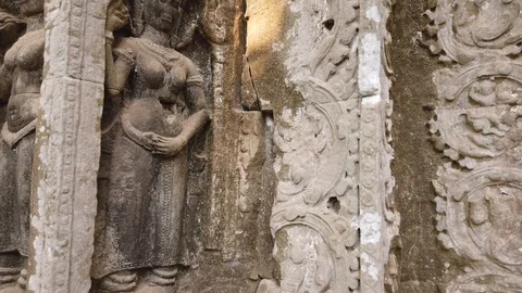 Bas-reliefs depicting the divine dancer Apsara, the temple of TA Prom Stock Footage 106051970