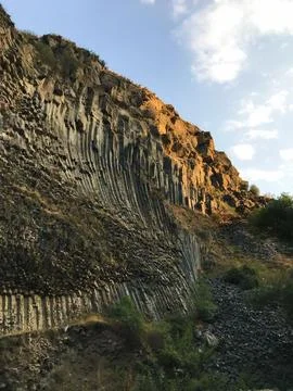 Basalt column cave in Armenia, background, wall, rock, stone, geology, volcanic Stock Photos