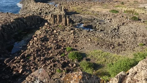 Basalt Columns and Rugged Coastline at Bombo Headland Geological Site, Kiam.. Stock Footage 312061572