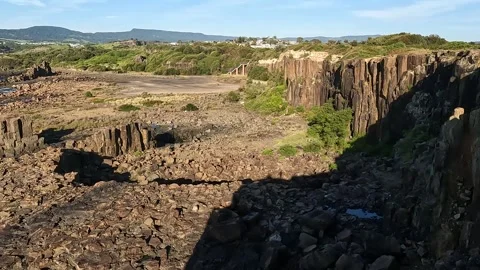 Basalt Columns and Rugged Coastline at Bombo Headland Geological Site, Kiam.. Stock Footage 312061587