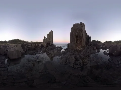 Basalt columns at sunset 360 Standing height Stock Footage 80360587