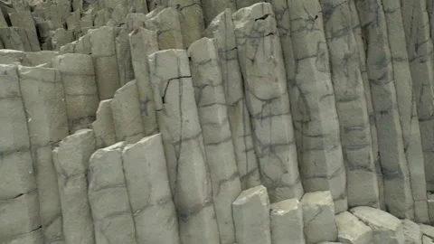 Basalt columns texture on Reynisfjara black sand beach Stock Footage 330281459