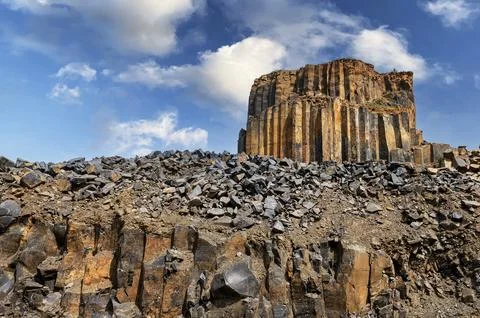 Basalt quarry. Columnar basalt quarry in summer. Volcanic stones. Geologic .. Stock Photos