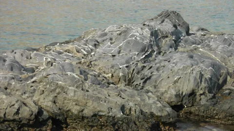 Basalt rock formations on the shore of Rhodes 動画素材 32303689
