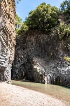 Basalt rocks and pristine water of Alcantara gorges in Sicily, Italy Stock Photos