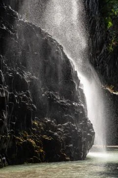 Basalt rocks and pristine water of Alcantara gorges in Sicily, Italy Stock Photos