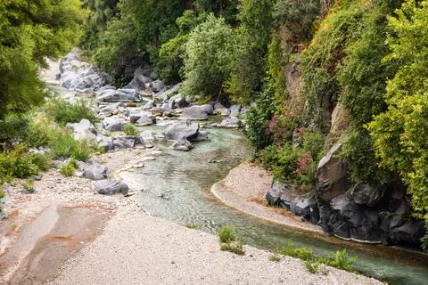 Basalt rocks and pristine water of Alcantara gorges in Sicily, Italy Stock Photos