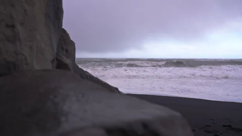 Basalt rocks and waves at Halsanefshellir Cave on Reynisfjara Beach 스톡 동영상 329442771