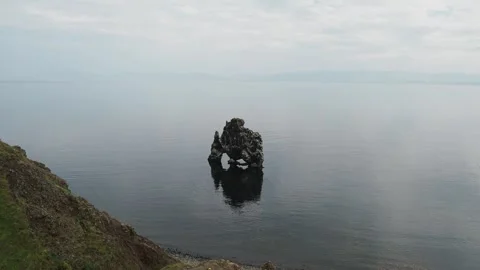 Basalt stack Hvitserkur in ocean in Iceland Stock Footage 318658793