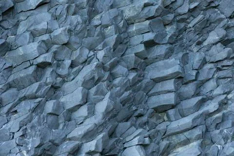 Basalt wall close up as background Stock Photos
