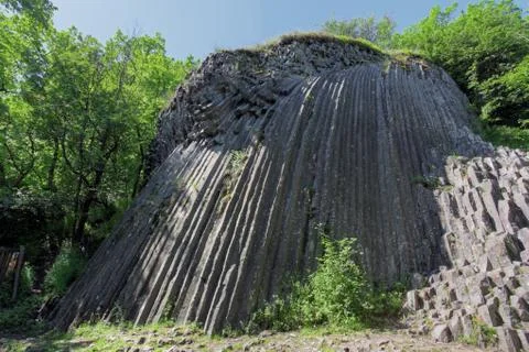 Basaltic pentagonal columns - geological formation of volcanic origin Stock Photos