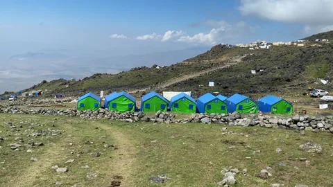 Base camp tents stand in wide view on Mount Ararat in Turkey Stock Footage 343804980