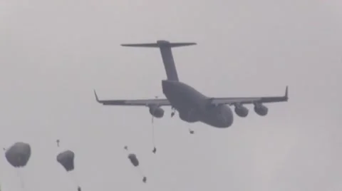 BASE CHARLSTON, MAY 2015, C17 aircraft parachute drop Aircraft fly away from Stock Footage 56172979