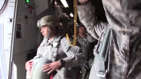 BASE CHARLSTON, US Air Force Parachute Troppers Jump Out C17 Hercules Video stock 56198066