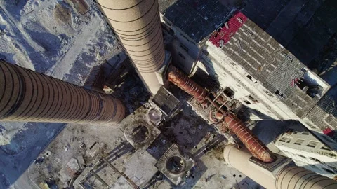 The base of a factory chimney with tilt camera movement and vertical climbin Stock Footage 330687113