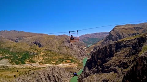 Base Jump Adventure in Steep Mountain Canyon Stock Footage 309483641