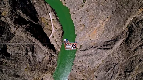 Base Jump Adventure in Steep Mountain Canyon Stock Footage 309483647