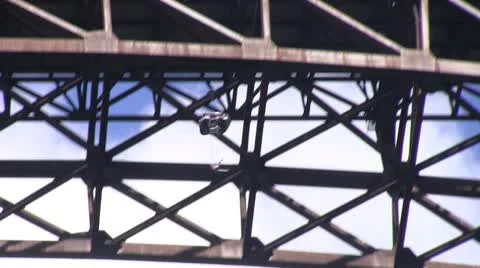 Base jumper jumping and deploying parachute Stock Footage 8850774