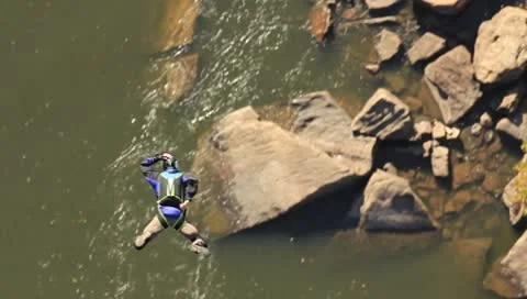 Base Jumper jumping off the New River Gorge Bridge Stock Footage 8848437
