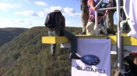 Base jumper jumps from bridge platform Video stock 8850845