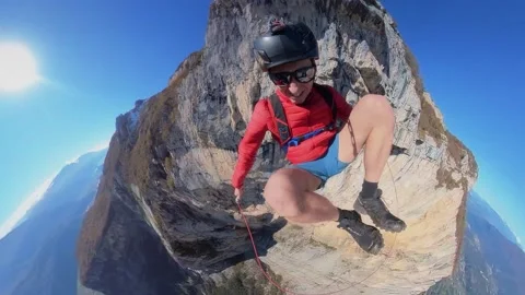 BASE Jumper Sets Record for Using a Jump Rope in Freefall, italy - 01 Mar 2024 Stock Footage 267748677
