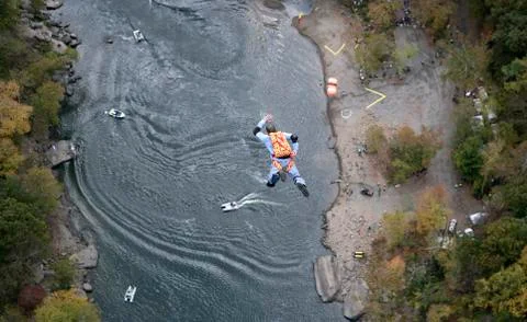 Base jumpers leap from the new river gorge bridge during 'bridge day 2008'. o Stock Photos