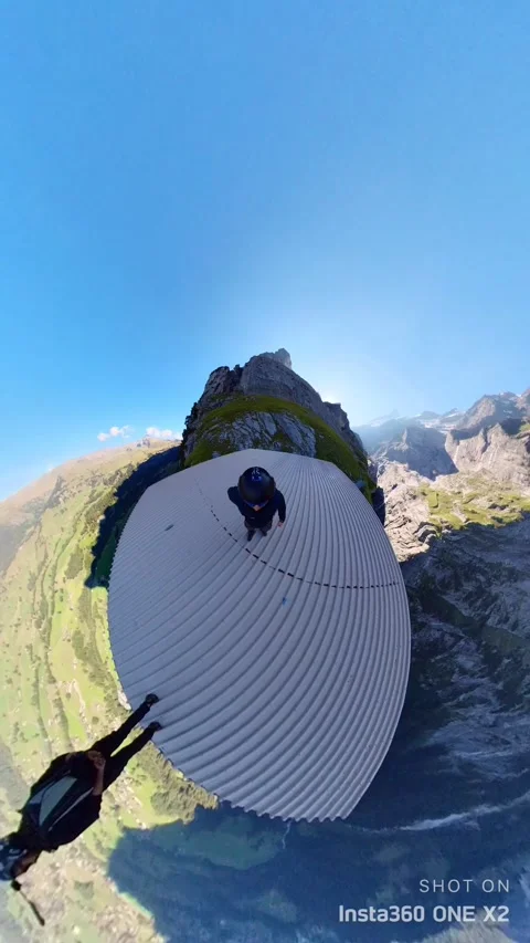BASE Jumping An Iconic Disused Gondola, Lauterbrunnen, Switzerland - 12 Sep 2023 Stock Footage 251231604