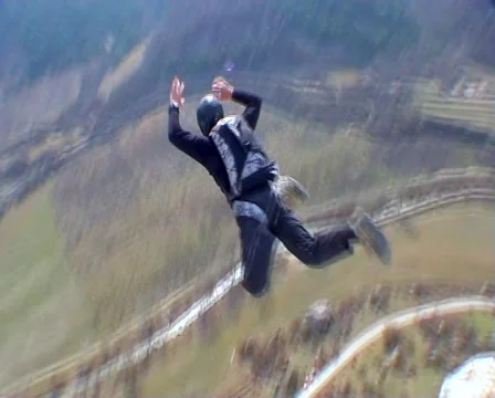 BASE jumping  skydiving from the mountain. Video stock 47712365