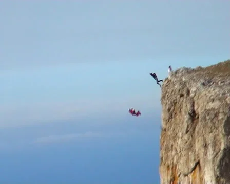BASE jumping  skydiving from the mountain. 스톡 동영상 47714414