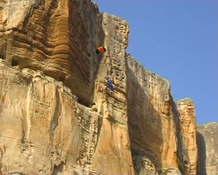 BASE jumping  skydiving from the mountain, subjective camera. Stock Footage 47720426